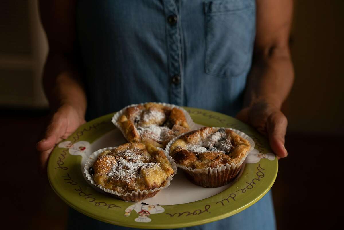 Renee McGhee serves her signature bread pudding, at her home in Berkeley, Calif., on Tuesday, October 2, 2018.