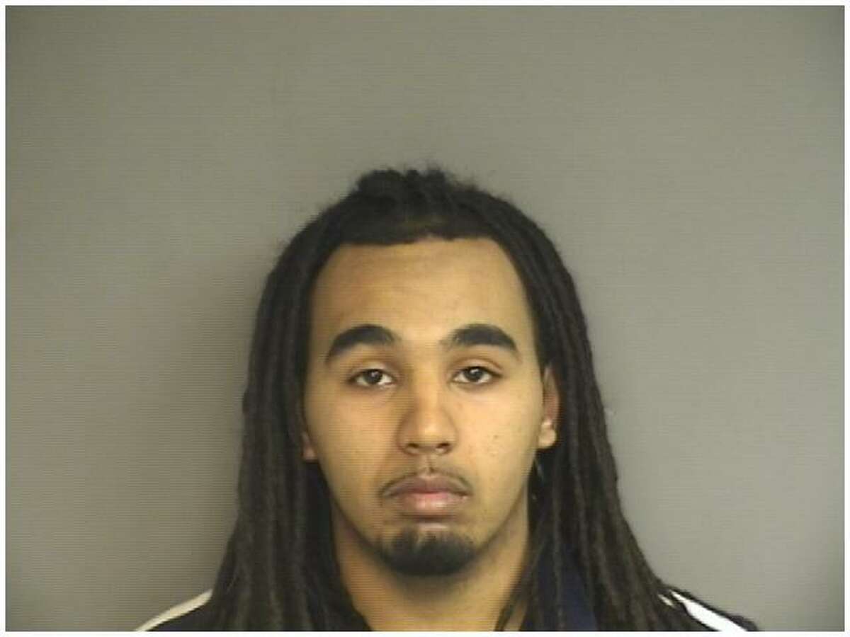 Morris Joel Moore, 23, of Stamford, was arrested for conspiracy to murder a 43-year-old woman who was shot to death at Lione Park Monday night.