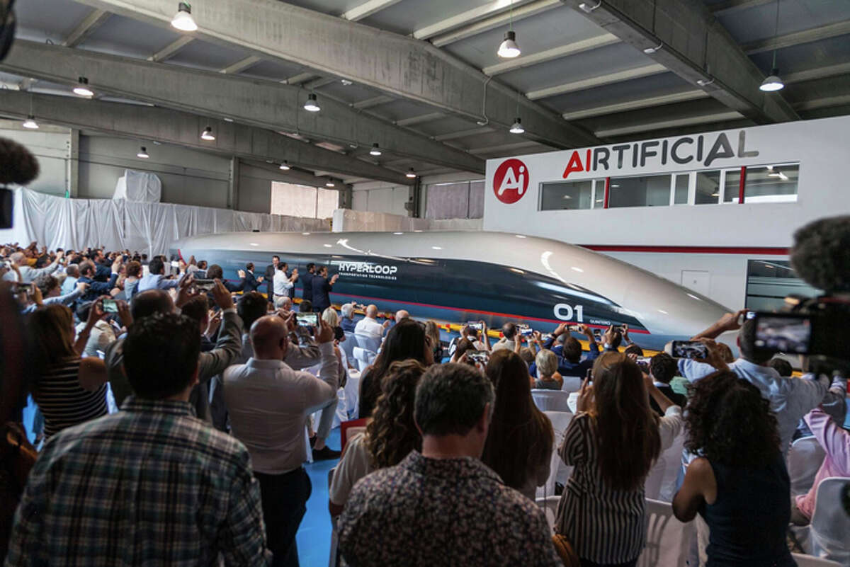 The unveiling ceremony for HyperloopTT's high-speed vehicle.