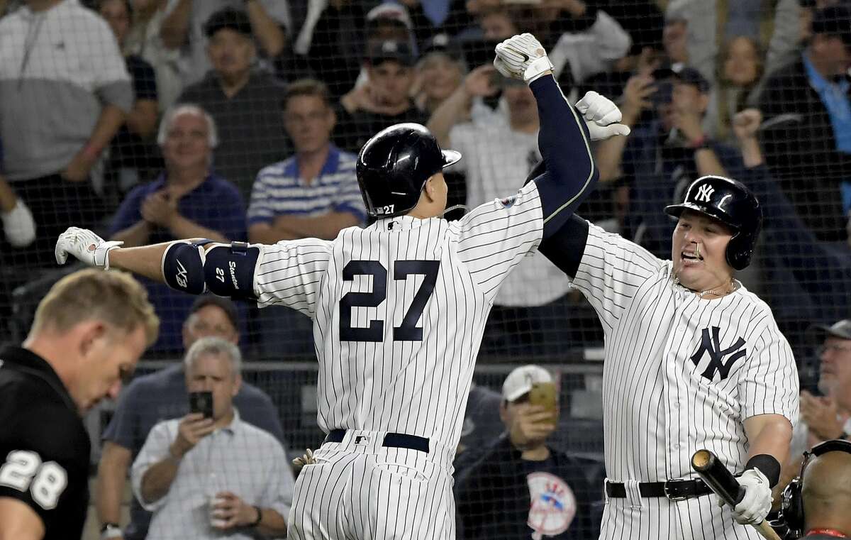 A's fan soaked in beer by Yankees fans had a happy ending after