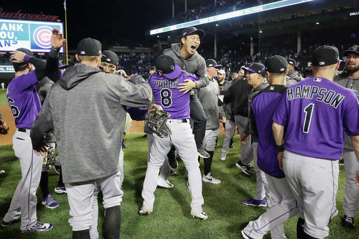 The Colorado Rockies celebrate defeating the Chicago Cubs 2-1 in thirteen innings to win the National League Wild Card Game at Wrigley Field on October 2, 2018 in Chicago, Illinois. (Photo by Jonathan Daniel/Getty Images)