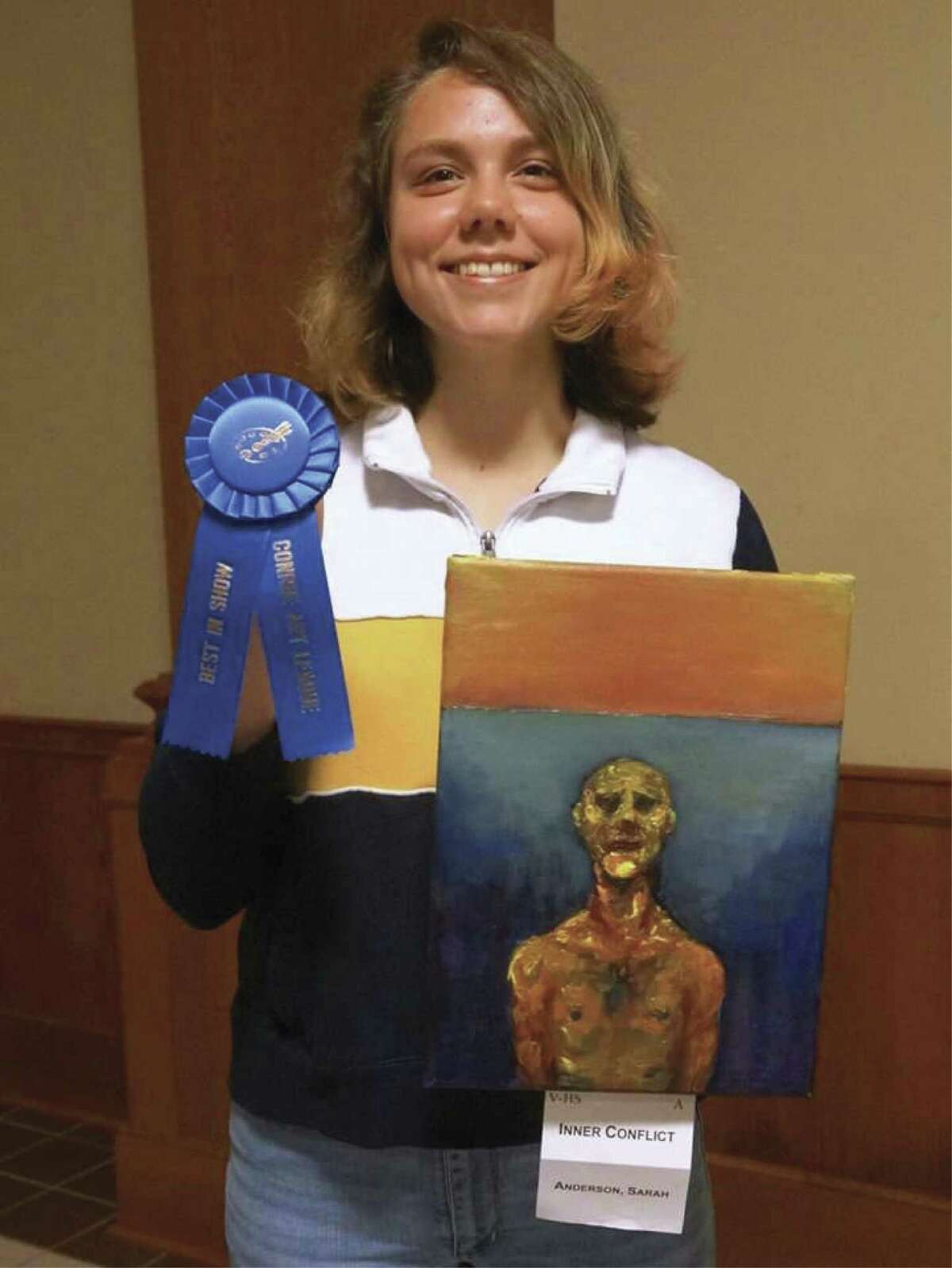Conroe High School student Sarah Anderson, and her High School Best of Show award-winning oil painting, "Inner Conflict," which will be on display at the Gallery at the Madeley Building throughout October.
