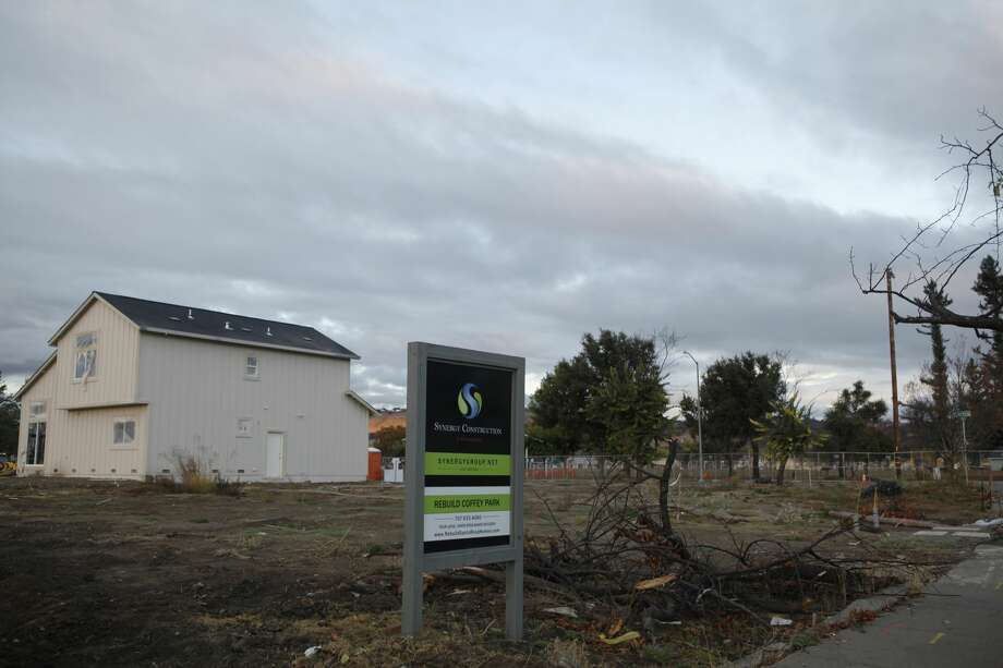 Rebuilding has begun near Dogwood Drive in the Coffey Park neighborhood of Santa Rosa, Calif. on Wednesday, Oct. 3, 2018. One year after the Wine Country Fires, progress is slow moving with some residents still uprooted and much more left to rebuild. Photo: Katie Wood/SFGATE 