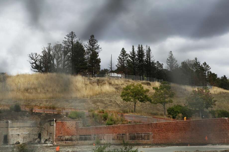 The Hilton Sonoma Wine Country sign on Wednesday, Oct. 3, 2018. One year after the Wine Country Fires, progress is slow moving with some residents still uprooted and much more left to rebuild. Photo: Katie Wood/SFGATE 