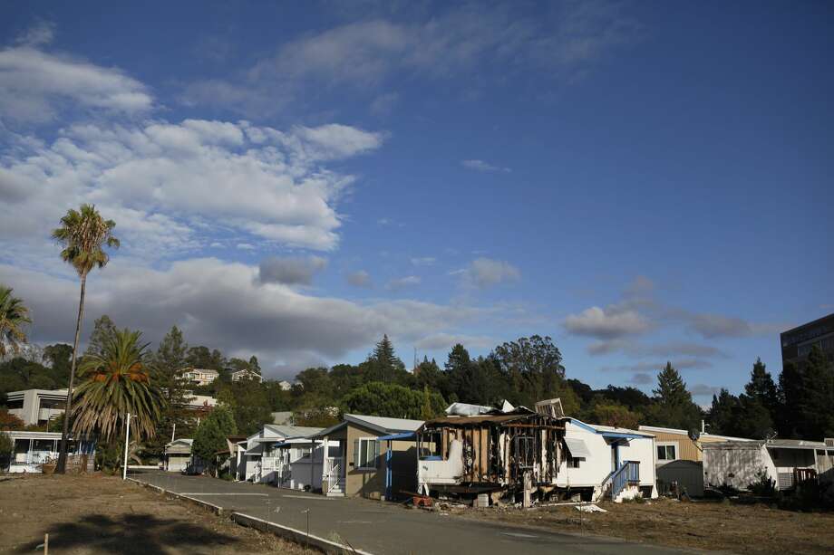 Mobile homes in the Journey's End mobile home park on Wednesday, Oct. 3, 2018. Journey's End resident Michelle Trammell says although her home escaped being demolished by the fires, it is too old to move. She has asked for help from FEMA but hasn't gotten any financial aid and has even asked Gov. Jerry Brown and President Trump to get involved. In the year since the fires, Trammell says things are worse for her now because she doesn't know what is going to happen with her mobile home since there are plans to rebuild condos and affordable senior housing at the location. As soon as she can afford to, Trammell says she wants to leave California for a cheaper state.

p.p1 {margin: 0.0px 0.0px 10.0px 0.0px; line-height: 12.0px; font: 10.0px Verdana; color: #000000; -webkit-text-stroke: #000000}
span.s1 {font-kerning: none}
 Photo: Katie Wood/SFGATE