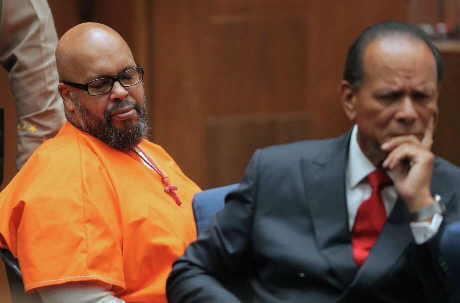 Marion & # 39; Suge & # 39; Knight reacts while he was sitting next to his lawyer, Albert DeBlanc, when sentenced to Los Angeles, California on October 4, 2018, where Knight had been sentenced to 28 years in prison for the fatal confrontation in front of a kiosk in Compton almost four years ago. (Photo by David McNew / POOL / AFP) DAVID MCNEW / AFP / Getty Images Photo: DAVID MCNEW / AFP or Licensors