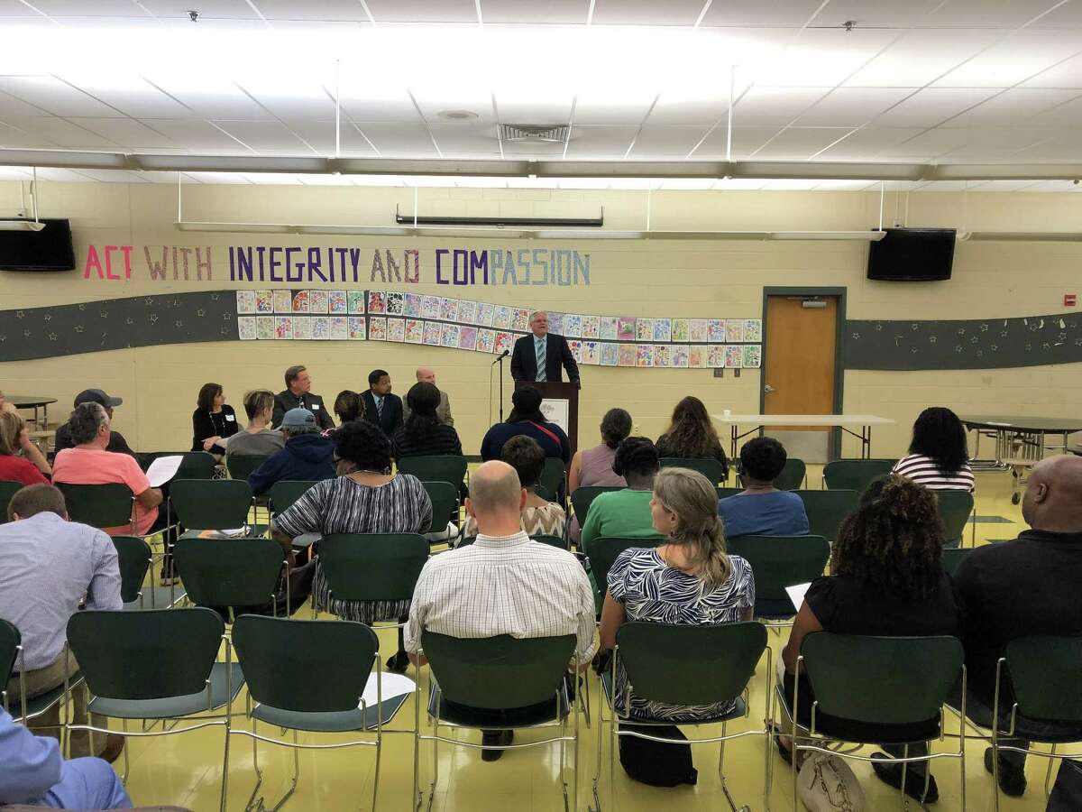 Parents of Wintergreen Interdistrict Magnet School students gathered Thursday to speak with ACES Executive Director Thomas Danehy as the redistricting process in Hamden continues. Here, Danehy speaks.