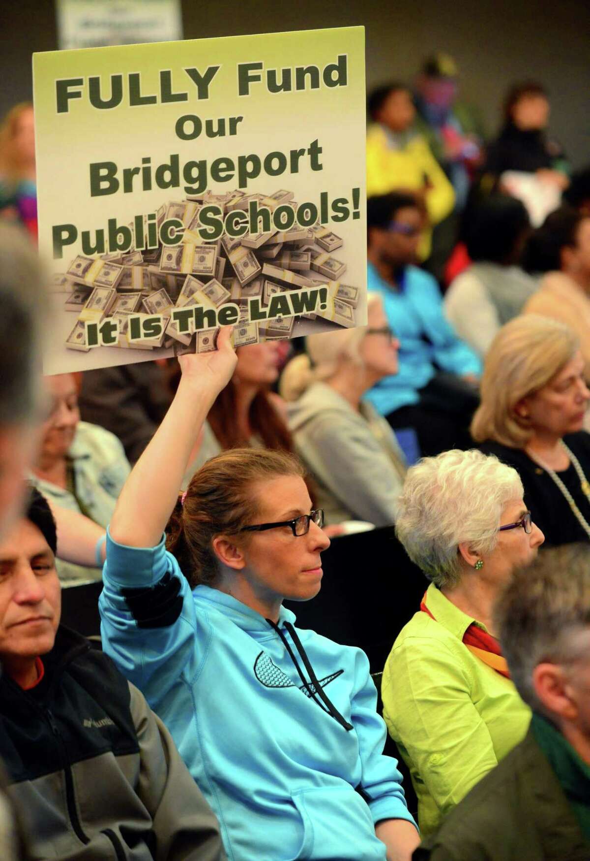 Parent Alissa Gerber along with hundreds of parents came out to tell the city council to fully fund the school board budget request during a committee meeting at City Hall's Council Chambers in Bridgeport, Conn., on Tuesday Apr. 25, 2017. The board wants $11.4 million over what it gets now.