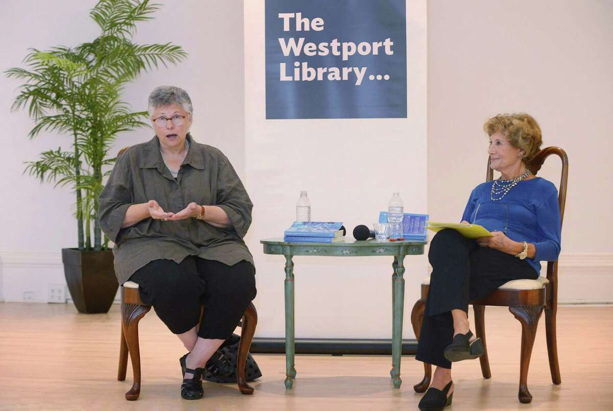 Bethany author Katharine Weber, left, speaks about her new novel, "Still Life With Monkey" with Publishers Weekly editor Sybil Steinberg, at the Westport Women's Club.