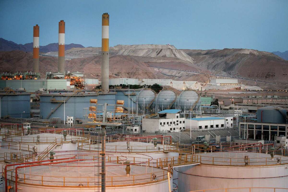 Storage sphere tanks, center, for liquefied natural gas (LNG) sit near oil storage tanks, below, in the Jordan Oil Terminal, in Aqaba, Jordan, on April 11, 2018. MUST CREDIT: Bloomberg photo by Annie Sakkab.