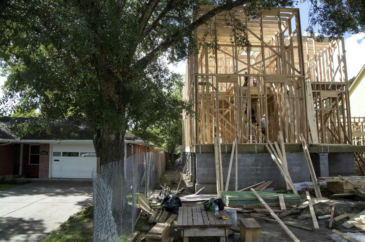PHOTOS: Hit hard by Harvey A new home is constructed in the 100-year floodplain along White Oak Bayou in the Timbergrove neighborhood, Friday, Oct. 5, 2018, in Houston. >>See how Harvey damaged Houston communities in the photos that follow...