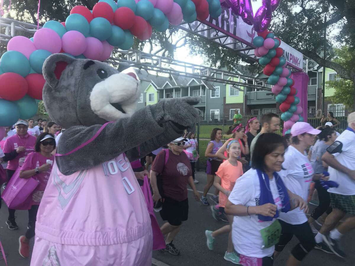 Mayor Sylvester Turner and Houston Rockets mascot Clutch were among those supporting breast cancer survivors and supporters at the Race for the Cure on Saturday.