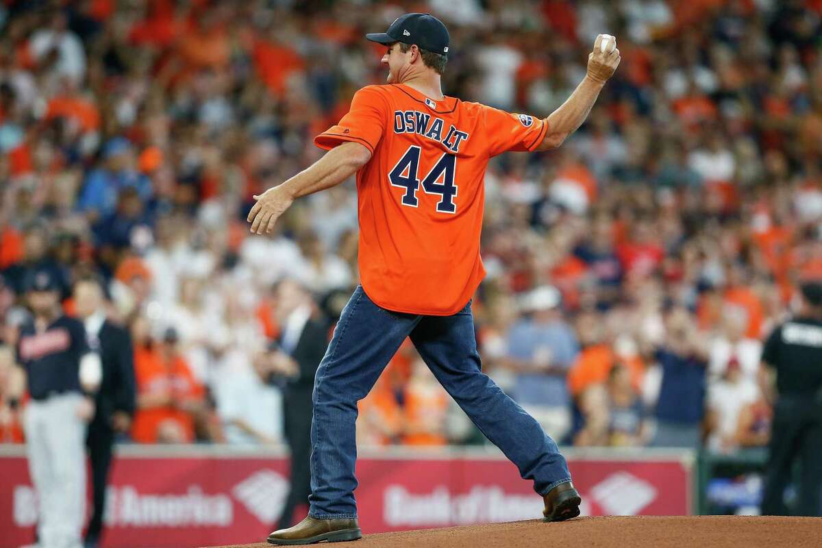 HOUSTON, TX - OCTOBER 06: Former Houston Astros pitcher Roy Oswalt throws out the first pitch prior to Game Two of the American League Division Series between the Houston Astros and the Cleveland Indians at Minute Maid Park on October 6, 2018 in Houston, Texas.
