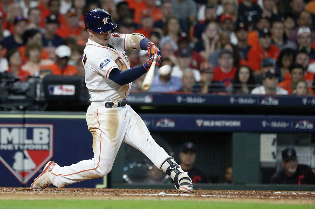 Houston Astros third baseman Alex Bregman (2) hits a home run in the seventh inning of Game 2 of the American League Division Series at Minute Maid Park on Saturday, Oct. 6, 2018, in Houston.