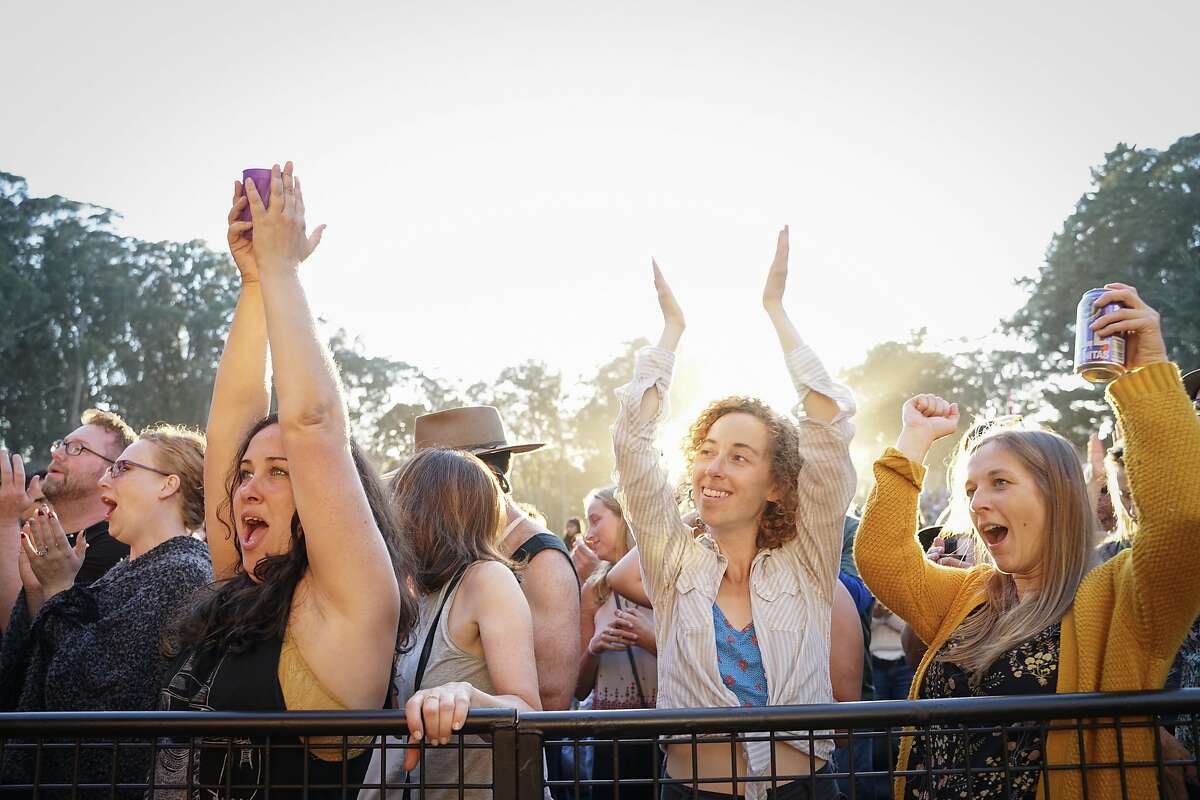 (Left to right) Dorothy Bedecarre, Sam Stone and Makenzi Rasey of Buffalo, cheer during Ani DiFranco�s performance at Hardly Strictly Bluegrass music festival at Golden Gate Park in San Francisco, Calif. on Saturday, October 6, 2018.