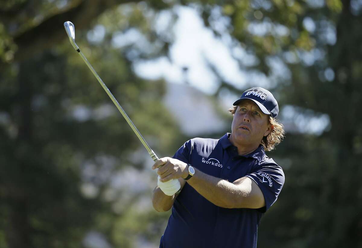 Phil Mickelson follows his shot from the second tee of the Silverado Resort North Course during the final round of the Safeway Open PGA golf tournament Sunday, Oct. 7, 2018, in Napa, Calif. (AP Photo/Eric Risberg)