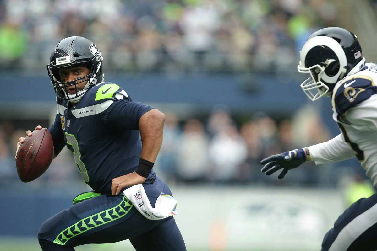 Russell Wilson gives $156,000 in  stock to his linemen