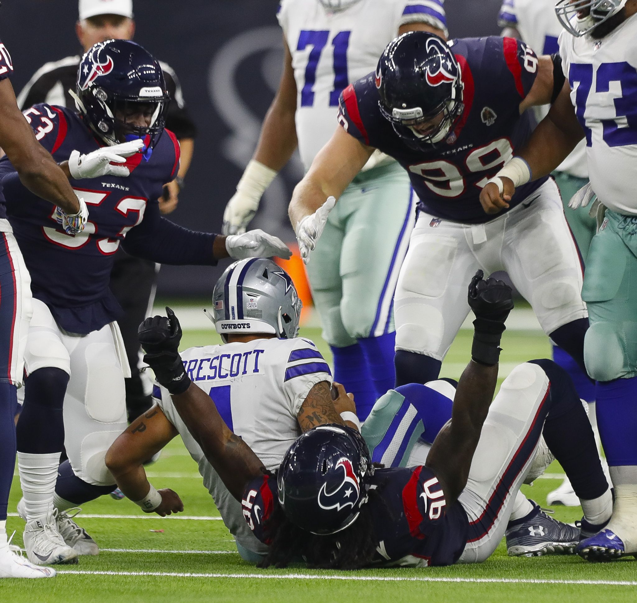 Houston, Texas, USA. 7th Oct, 2018. Houston Texans defensive end J.J. Watt  (99) reaches out to sack Dallas Cowboys quarterback Dak Prescott (4) during  the fourth quarter of the NFL regular season