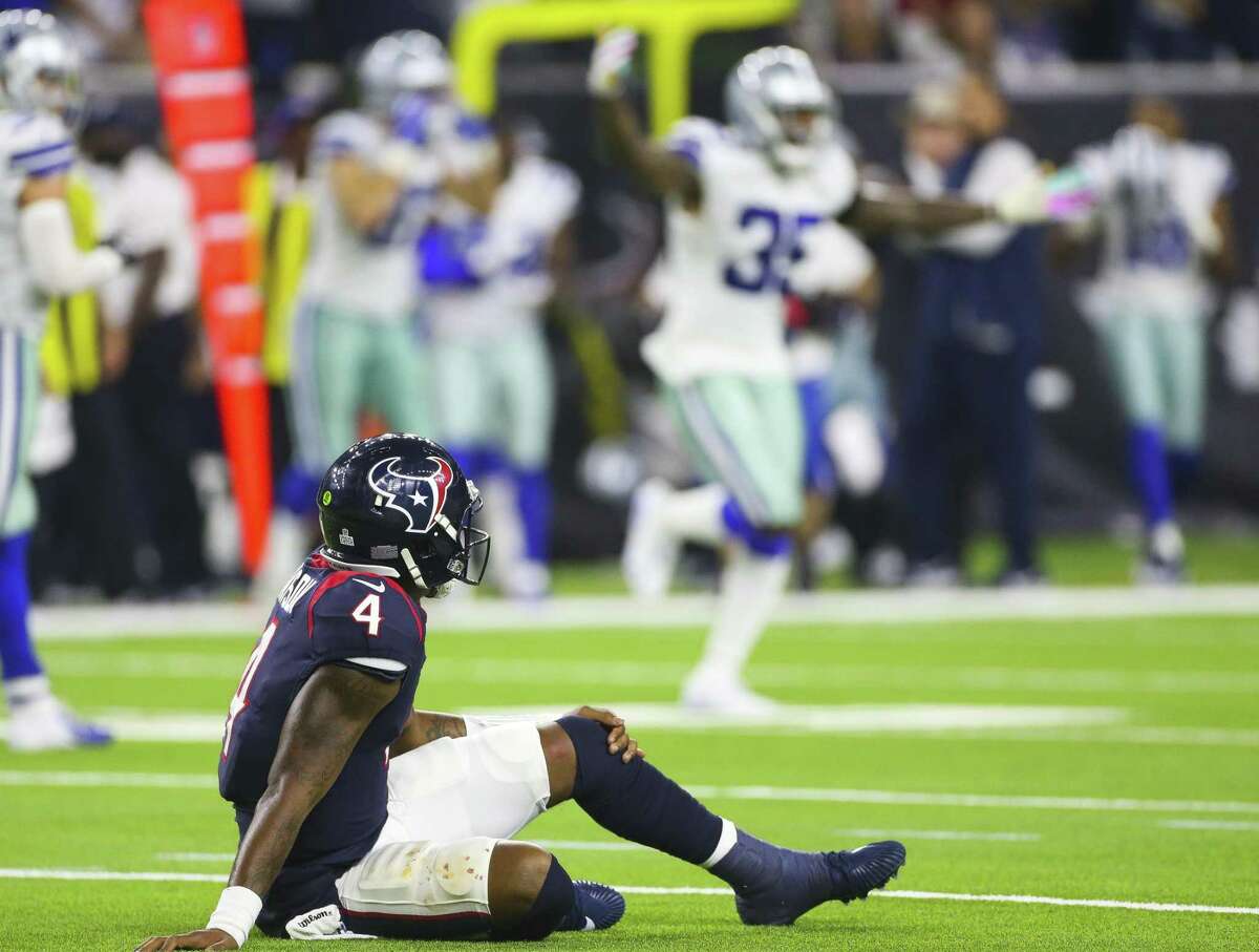 December 8, 2019: Houston Texans quarterback Deshaun Watson (4) gets the  ball past the goal line for a touchdown while being defended by Denver  Broncos strong safety Will Parks (34) during the