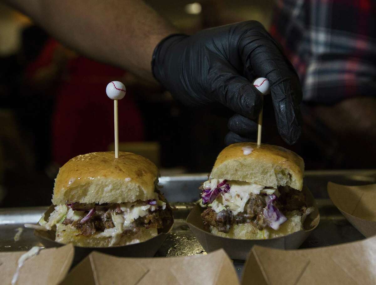 Tiny baseballs adorned toothpicks in sliders from Pinkerton’s Barbecue at the Top 100 Culinary Stars event at the Houston Chronicle. Tickets for the Oct. 25 event are available at culinarystars.com.
