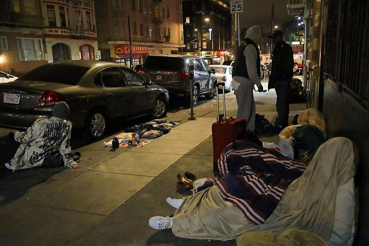 Homeless people on the 300 block of Hyde Street in San Francisco, Sept. 14, 2018. The city’s new mayor has made cleaner streets a top priority. Residents say it will take much more than a broom to do it. (Jim Wilson/The New York Times)