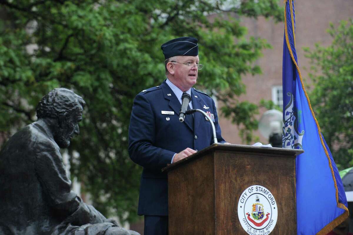 Col. Mark McGrath speaks during the ceremony at Veterans' Park following the annual Memorial Day parade in downtown Stamford, Conn. on Sunday, May 27, 2018.
