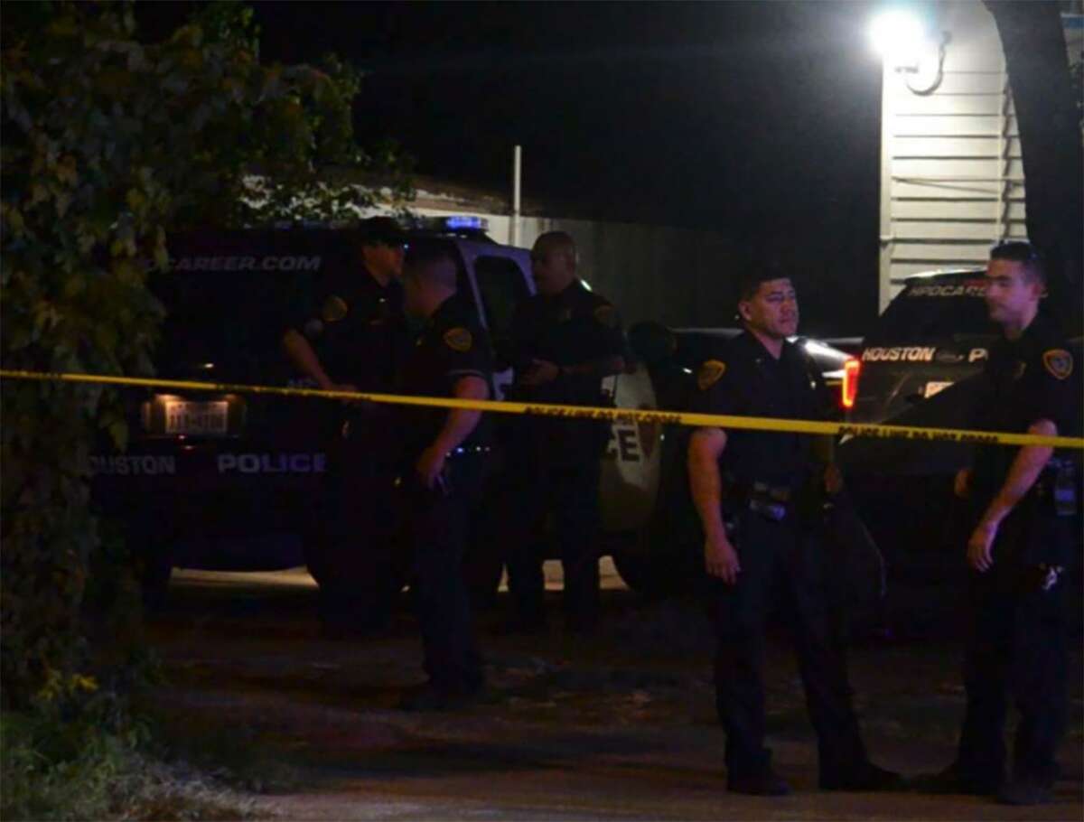 Houston police officers investigate a drive-by shooting where a 12-year-old girl was shot in northwest Houston on Friday, Oct. 5, 2018.