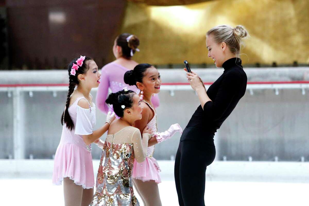 IMAGE DISTRIBUTED FOR PATINA RESTAURANT GROUP/THE RINK AT ROCKEFELLER CENTER - Five-time Finnish national champion figure skater Kiira Korpi hosts a ceremonial first skate marking the 82nd season opening of The Rink at Rockefeller Center, Monday, Oct. 8, 2018 in New York. Korpi was joined on the most famous ice rink in the world by rising youth skaters from Ice Theatre of New York and Figure Skating in Harlem. (Jason DeCrow/AP Images for Patina Restaurant Group/The Rink at Rockefeller Center)