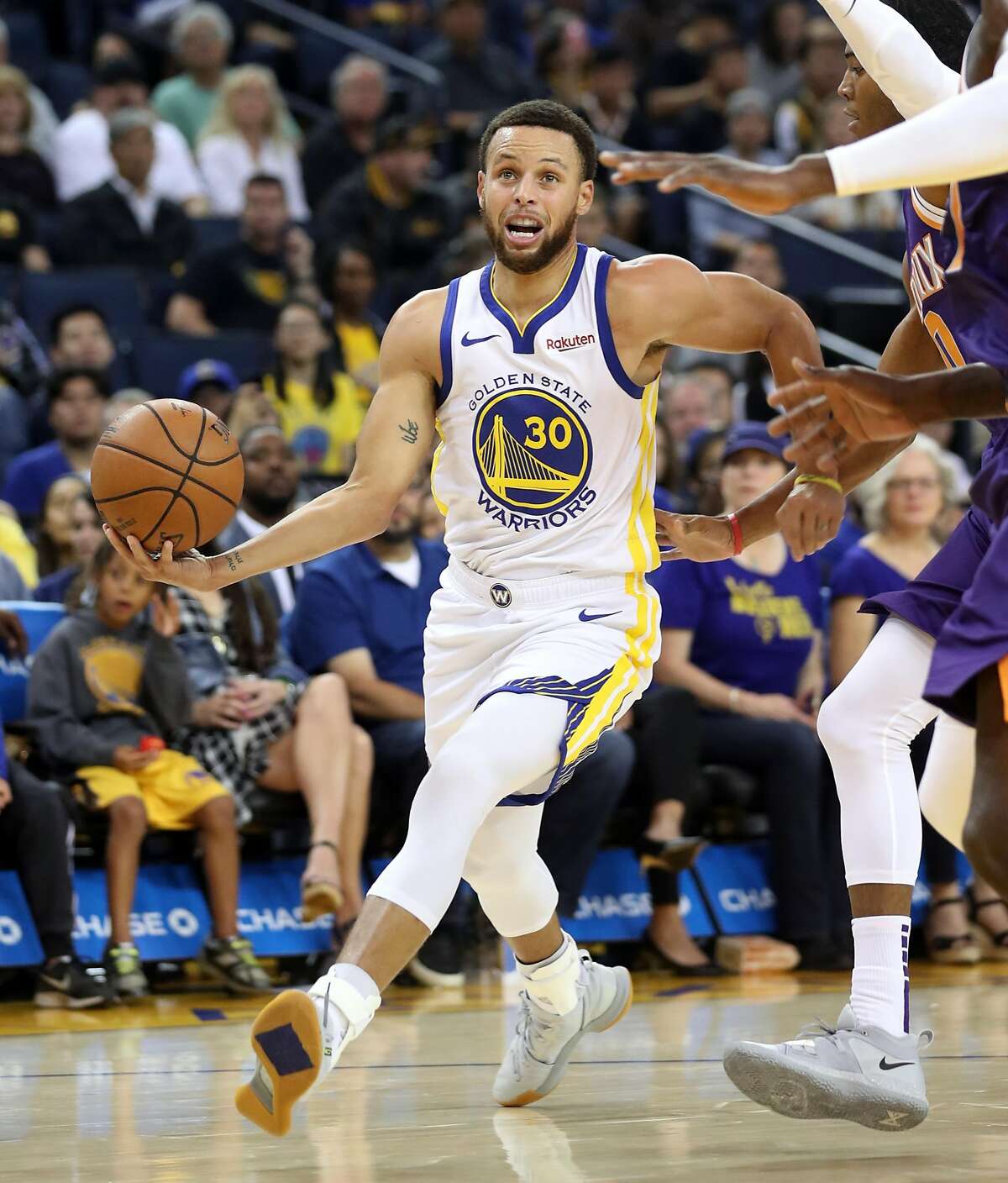 Warriors lose their cool in preseason loss to Suns