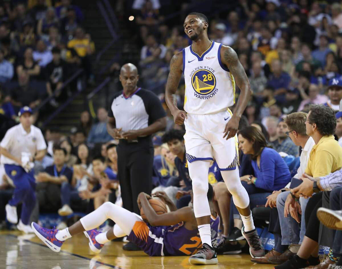 Golden State Warriors' Alfonzo McKinnie reacts to being called for a foul in 1st quarter against Phoenix Suns during NBA preseason game at Oracle Arena in Oakland, Calif. on Monday, October 8, 2018.