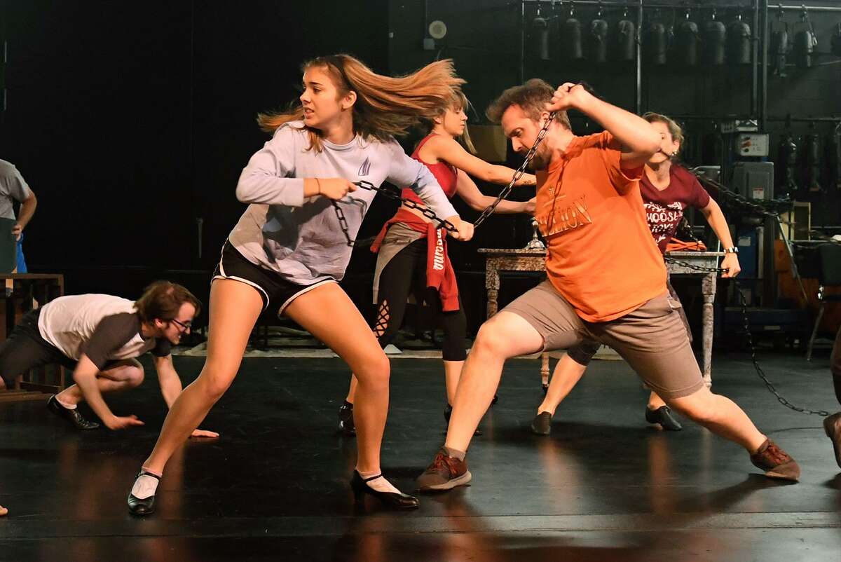 Lucy Campbell, from left, and Josef Anderson work a dance scene during a rehearsal of the upcoming Stageworks Theatre production of "A Christmas Carol" at The Lone Star College - Cy-Fair Performing Arts Center on Sept. 26, 2018.