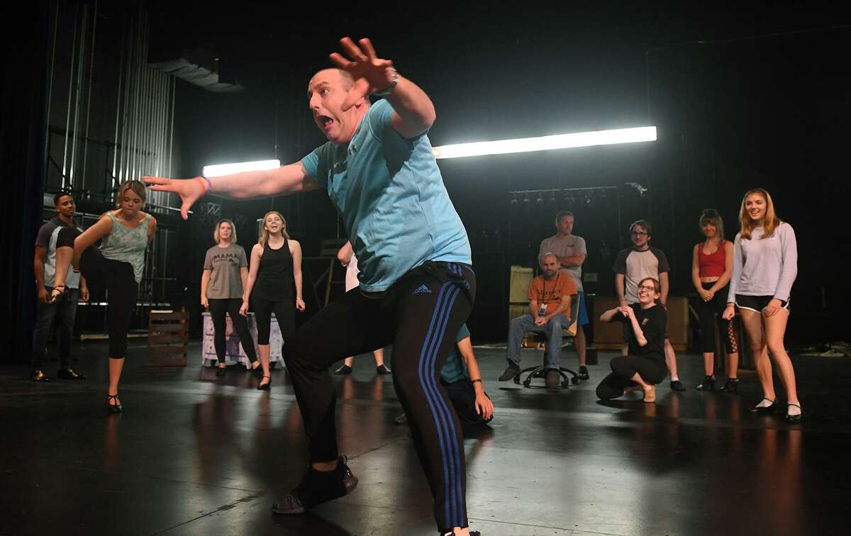 Choreographer Adam Delka leads his dancers during a rehearsal of the upcoming Stageworks Theatre production of "A Christmas Carol" at The Lone Star College - Cy-Fair Performing Arts Center on Sept. 26, 2018.