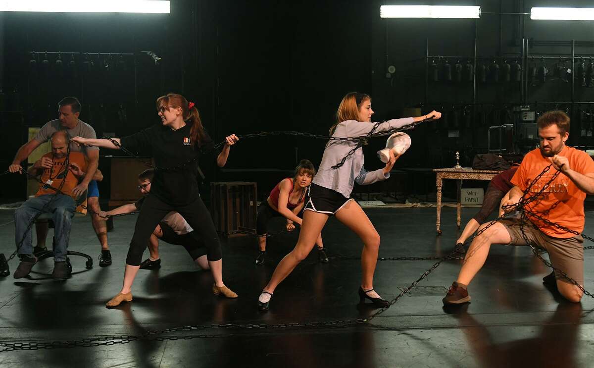 Kristen Malisewski, from left, Lucy Campbell, and Josef Anderson work a dance scene during a rehearsal of the upcoming Stageworks Theatre production of "A Christmas Carol" at The Lone Star College - Cy-Fair Performing Arts Center on Sept. 26, 2018.