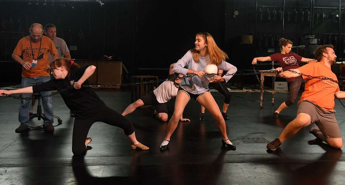 Kristen Malisewski, from left, Lucy Campbell, and Josef Anderson work a dance scene during a rehearsal of the upcoming Stageworks Theatre production of "A Christmas Carol" at The Lone Star College - Cy-Fair Performing Arts Center on Sept. 26, 2018.