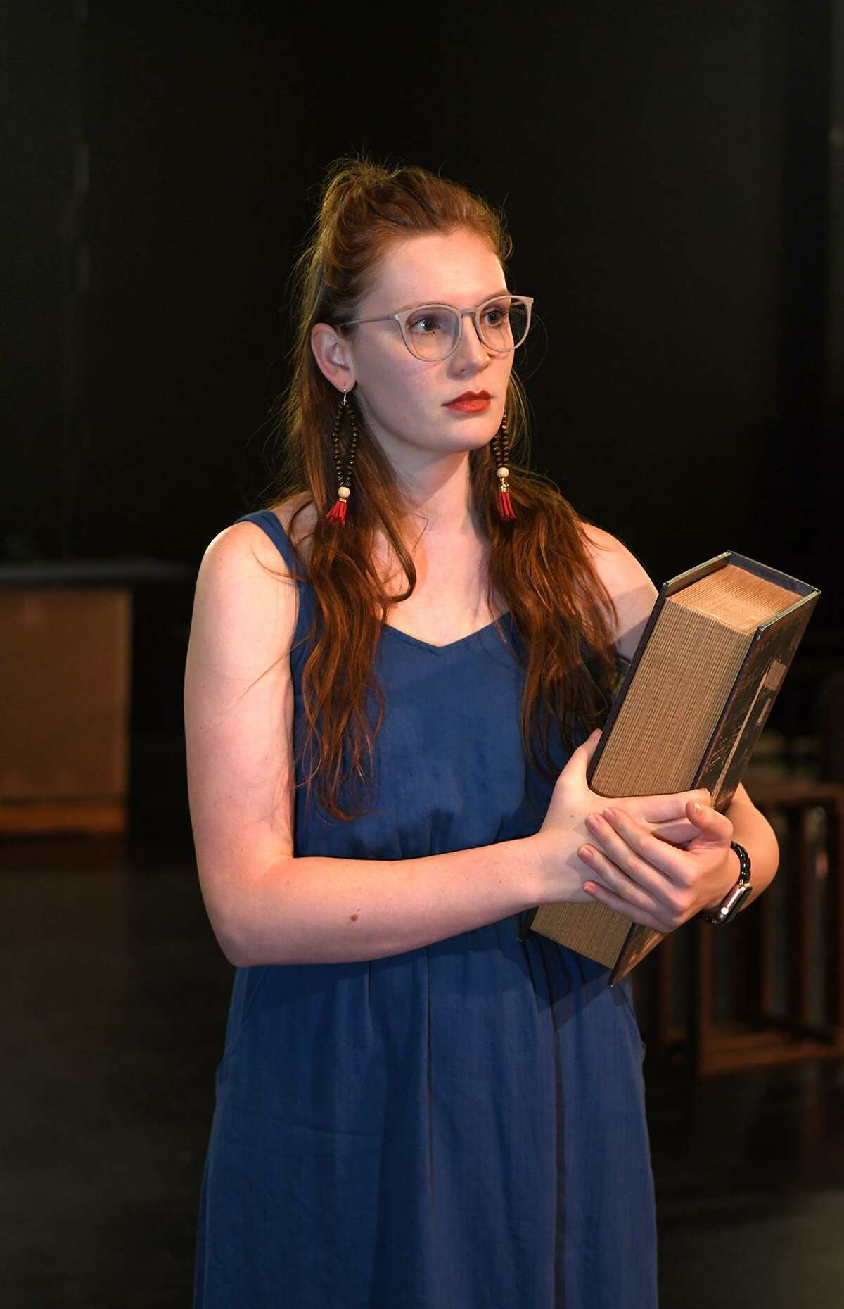 Courtney Berry, of Spring, who takes the part of "The Ghost of Christmas Past", listens to instructions during a rehearsal of the upcoming Stageworks Theatre production of "A Christmas Carol" at The Lone Star College - Cy-Fair Performing Arts Center on Sept. 26, 2018.