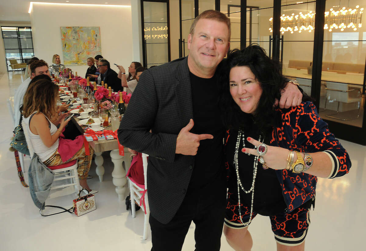 Tilman Fertitta and Ashley Longshore at a media luncheon at the new offices of DPWPR in The Post Oak Thursday Oct. 04,2018.