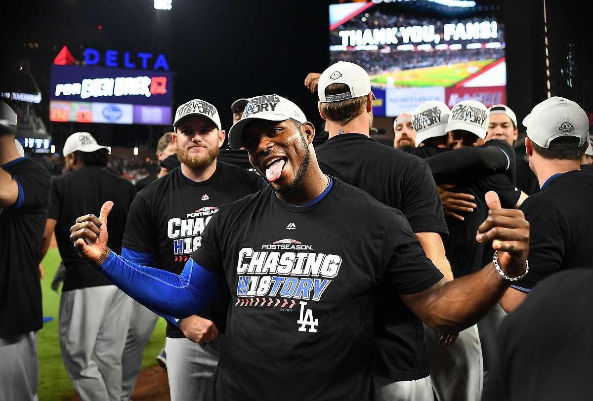 Los Angeles Ddogers outfielder Yasiel Puig celebrates on the field after a 6-2 series-clinching win against the Atlanta Braves in Game 4 a National League Division Series on Monday, Oct. 8, 2018, at SunTrust Park in Atlanta. (Wally Skalij/Los Angeles Times/TNS)