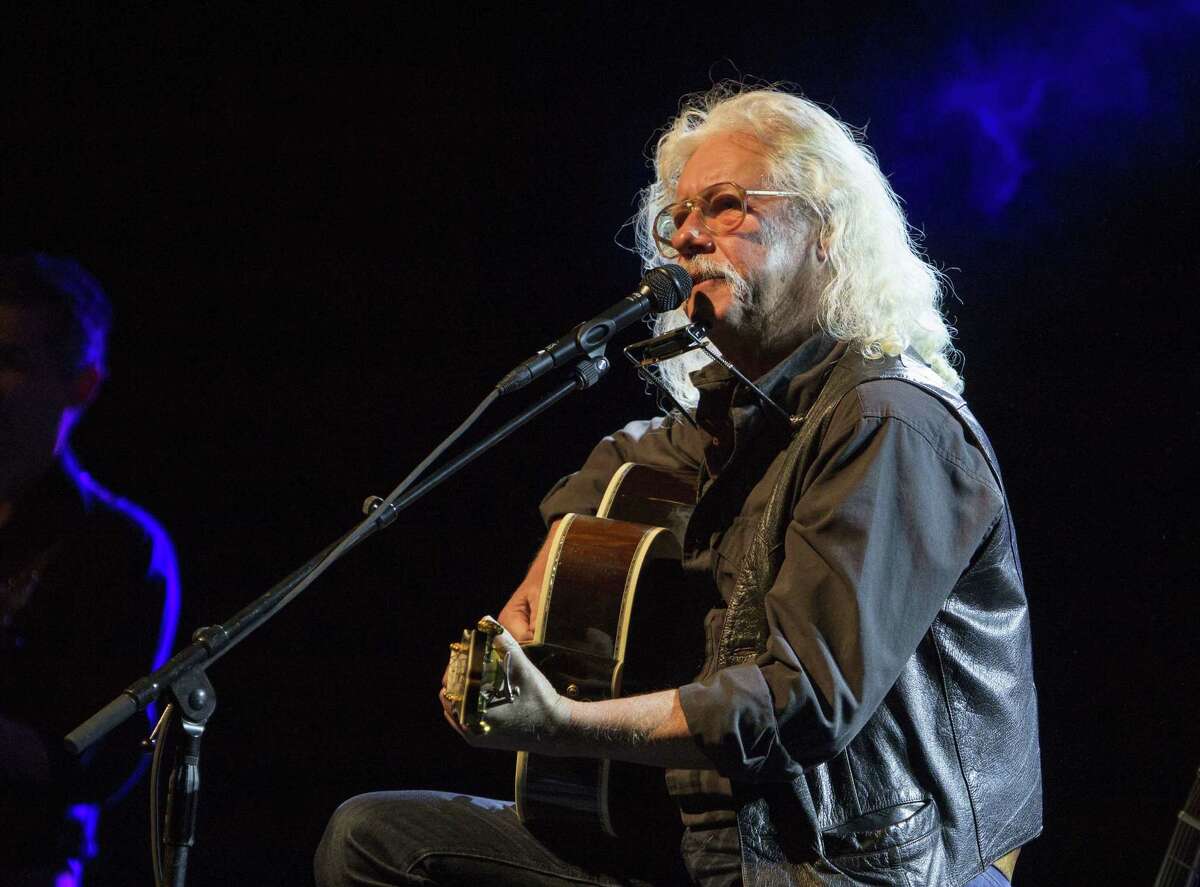 Arlo Guthrie performs during the Arlo Guthrie: Alice's Restaurant 50th Anniversary Tour in Atlanta in 2015.