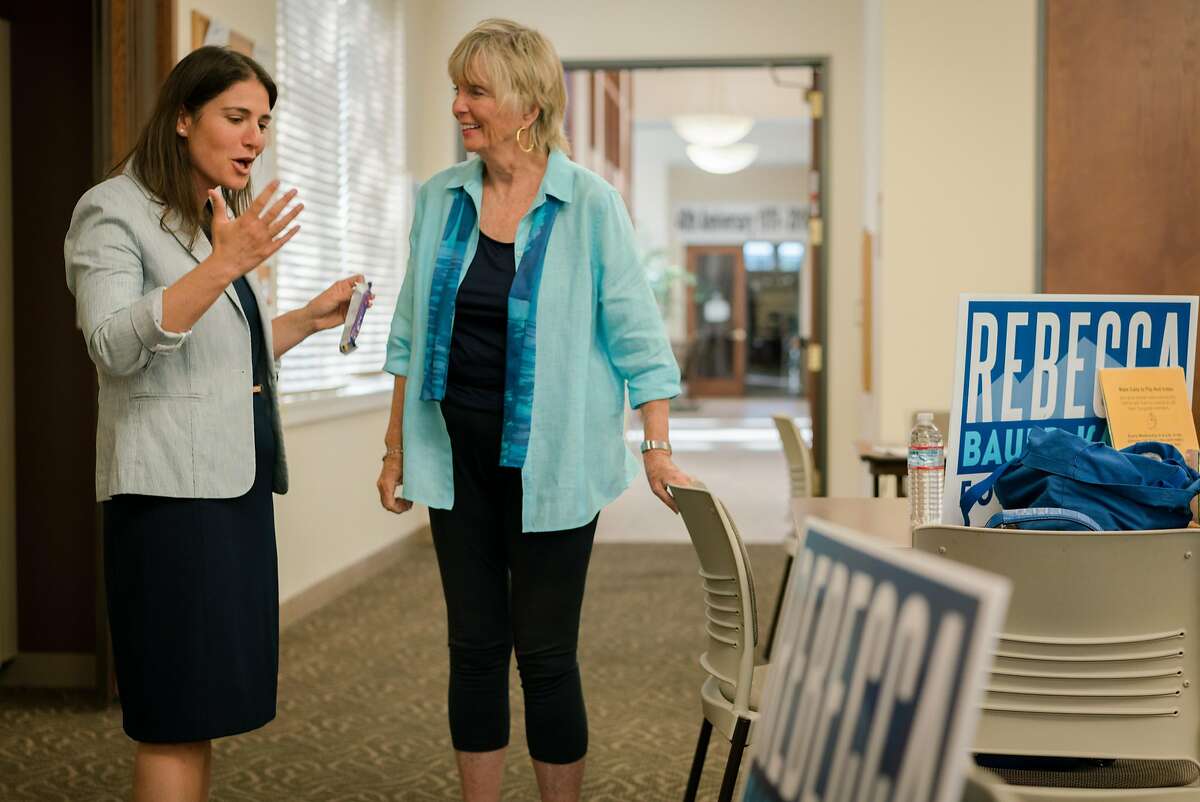 (Left) Rebecca Bauer-Kahan talks with Sheilah Fish of Moraga, at a phone bank in Walnut Creek, Calif., on Wednesday, September 26, 2018.