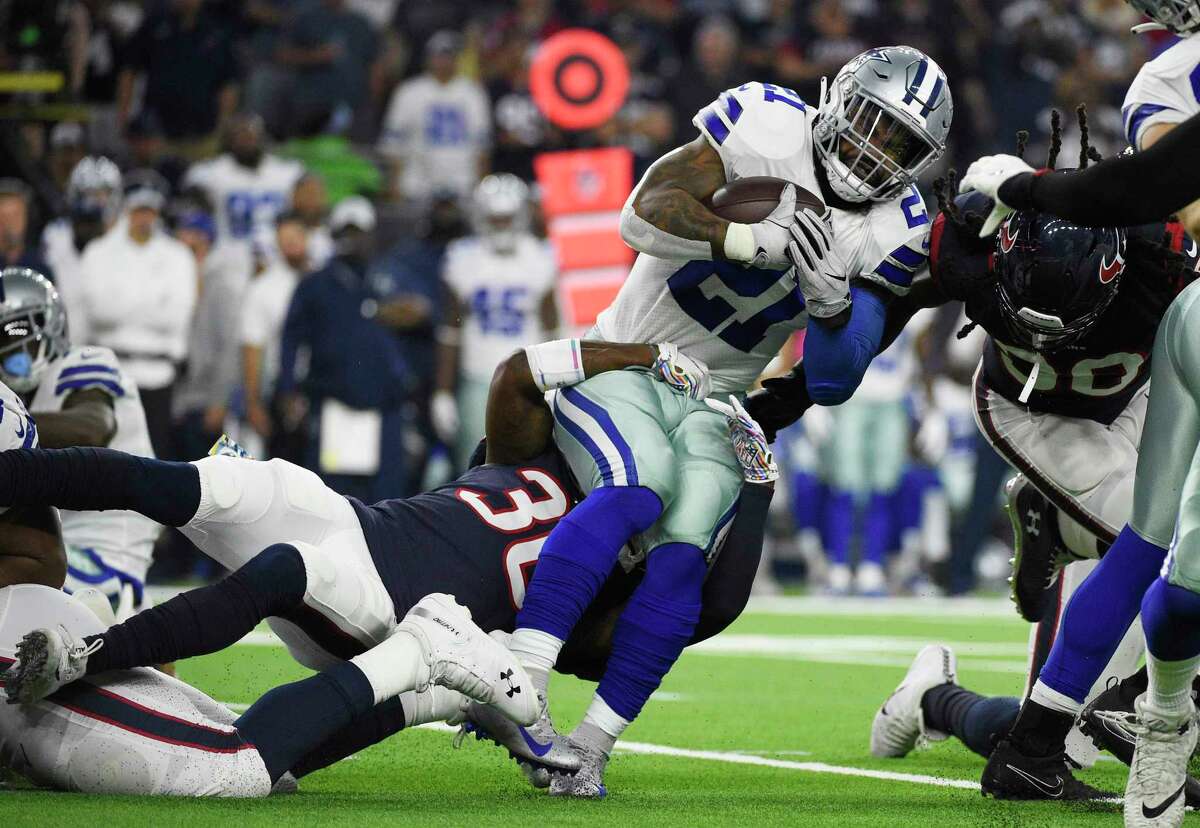 PHOTOS: Texans vs. Colts  Dallas Cowboys running back Ezekiel Elliott (21) is stopped by Houston Texans defensive back Kayvon Webster (36) during the first half of an NFL football game, Sunday, Oct. 7, 2018, in Houston. (AP Photo/Eric Christian Smith)  >>>See game action from the Texans' game against the Colts on Sunday ... 