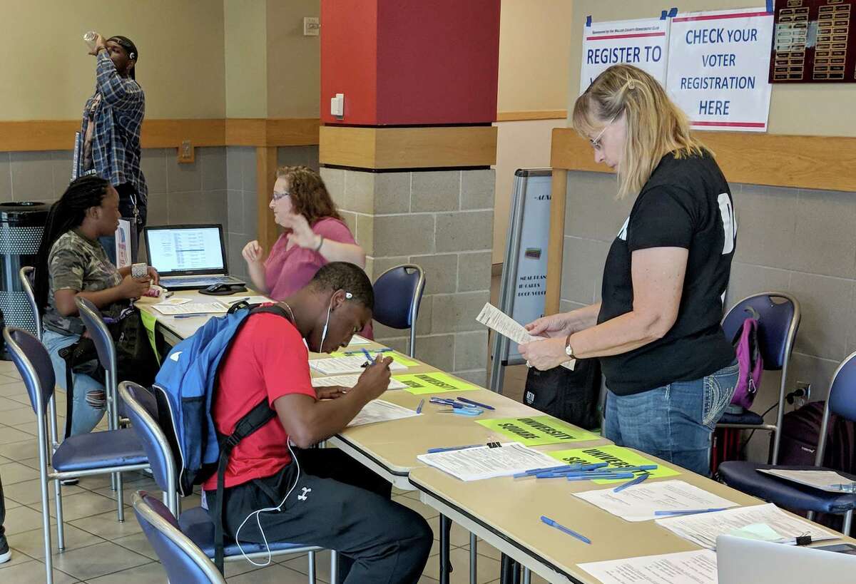 Prairie View A&M University students register to vote on Tuesday, the deadline to be able to cast a vote in the November election in Texas.