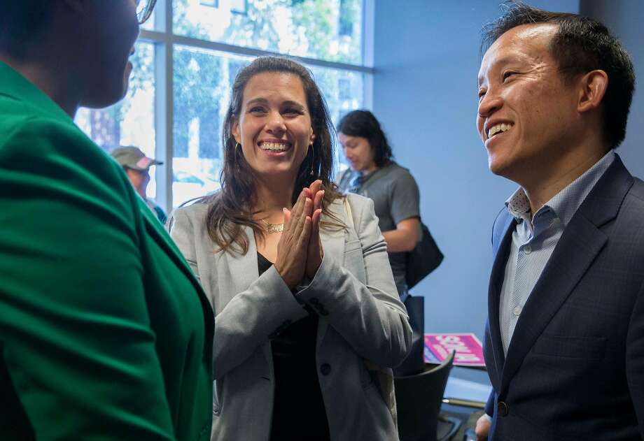 Board of Supervisors District 6 candidate Sonja Trauss, center, chats with fellow District 6 Supervisor candidate Christine Johnson, left, and Assemblyman David Chiu during a canvasing event at SoMa Square apartment complex in San Francisco, Calif. Saturday, Sept. 22, 2018. Photo: Jessica Christian / The Chronicle