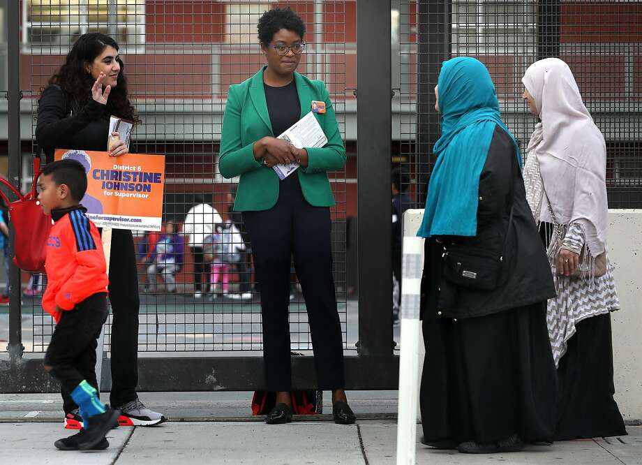 Christine Johnson (middle), candidate for D6, canvassing with her campaign coordinator Miriam Zouzounis (left) at Bessie Elementary school on Wednesday, Oct. 3, 2018, in San Francisco, Calif. Photo: Liz Hafalia / The Chronicle