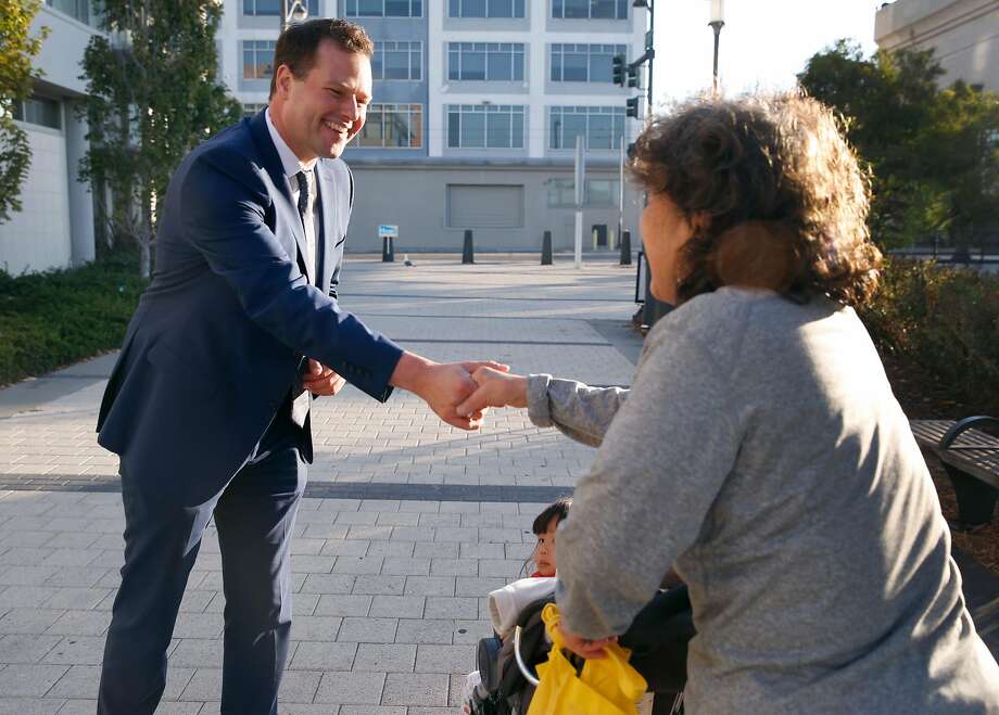 Board of Supervisors District 6 candidate Matt Haney meets greets a voter in the Mission Bay neighborhood in San Francisco, Calif. on Thursday, Sept. 20, 2018. Photo: Paul Chinn / The Chronicle