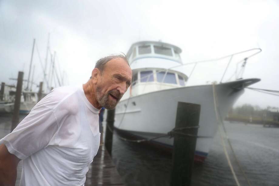 Ellis Davis makes sure his boat is secure as the outer bands of hurricane Michael arrive on October 10, 2018 in Panama City, Florida. The hurricane is forecast to hit the Florida Panhandle at a possible category 4 storm. (Photo by Joe Raedle/Getty Images) Photo: Joe Raedle, Getty Images