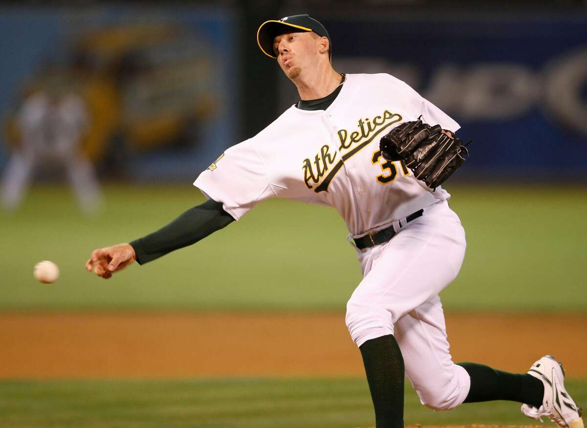 Oakland Athletics closing pitcher Brad Ziegler pitches in the 9th inning. The Oakland Athletics host the Tampa Bay Rays in a Major League Baseball game at McAfee Coliseum in Oakland, Calif., on August 12, 2008.