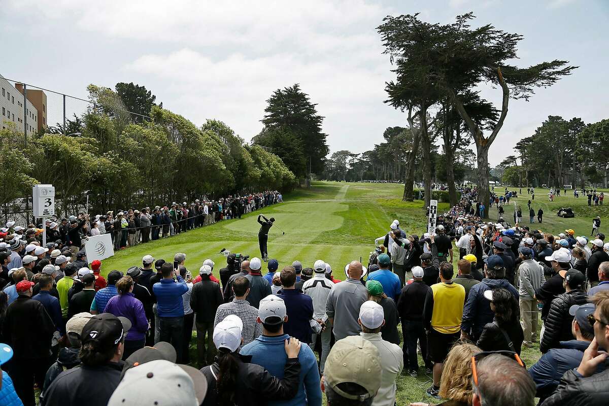Rory McIlroy, of Northern Ireland, hits from the third tee of TPC Harding Park against Gary Woodland in the finals of the Match Play Championship golf tournament Sunday, May 3, 2015, in San Francisco. (AP Photo/Eric Risberg)