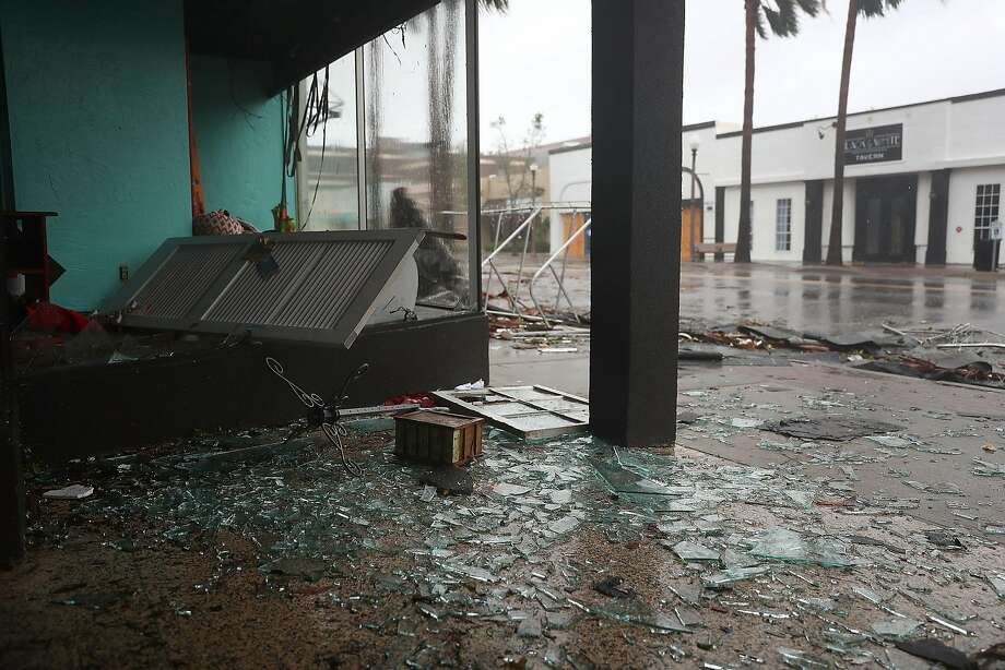 A stores windows are seen shattered as hurricane Michael passed through the downtown area on October 10, 2018 in Panama City, Florida. The hurricane hit the Florida Panhandle as a category 4 storm.  Photo: Joe Raedle, Getty Images