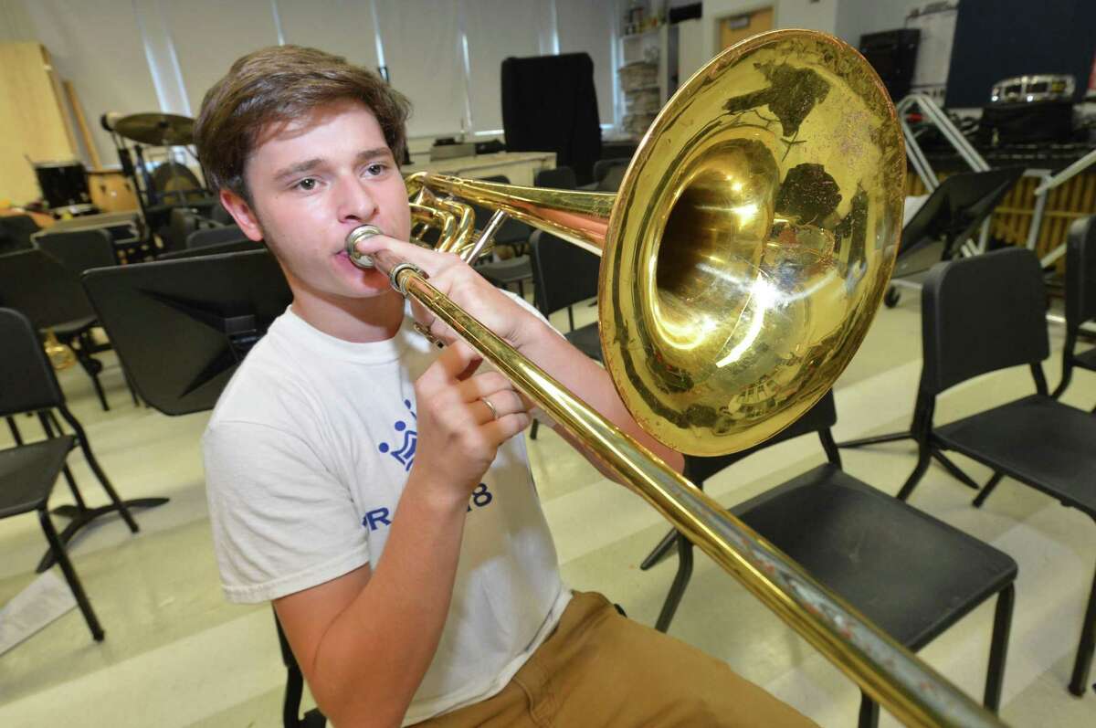 Brien McMahon High School senior Mike Secchi, practices in the band room on Wednesday October 10, 2018 in Norwalk Conn. Secchi, is a trombonist in the school band, and on weekends, takes part in the High School Jazz Academy at Lincoln Center, with some of the top players in the tri-state area.