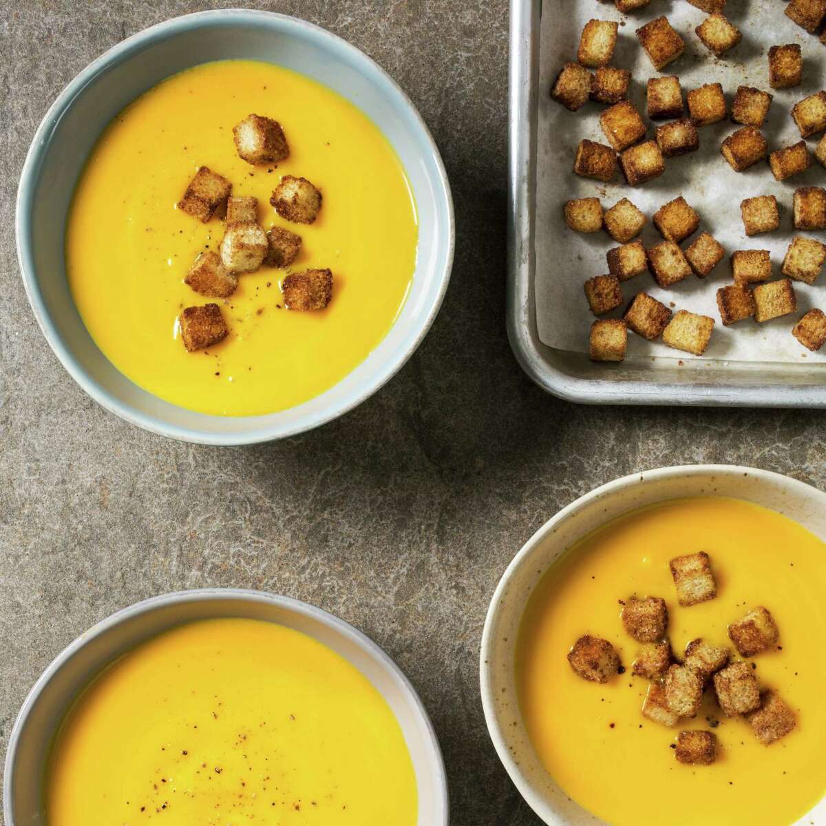 This undated photo provided by America's Test Kitchen in September 2018 shows creamy butternut squash soup in Brookline, Mass. This recipe appears in the cookbook "All-Time Best Soups." (Carl Tremblay/America's Test Kitchen via AP)